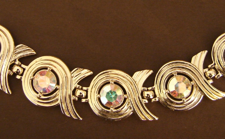 Sarah Coventry gold tone bracelet with aurora borealis stones