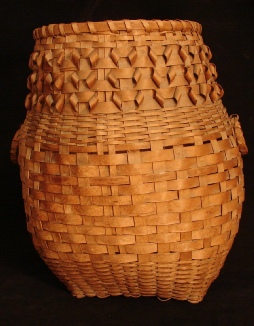 Native American large woven feather basket