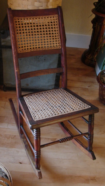 rocking chair with caned seat and back, side