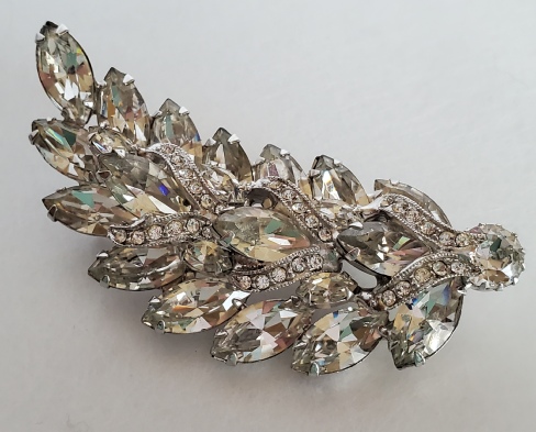 feather or leaf silver-tone brooch pin with rhinestones