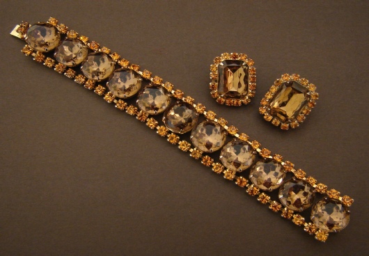 chunky deep amber large rhinestones gold tone bracelet and clip earrings, possibly Juliana