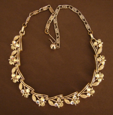 Lisner Aurora Borealis flower gold tone necklace 