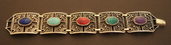 Sarah Coventry Granada line antiqued gold tone faux multi color stone bracelet