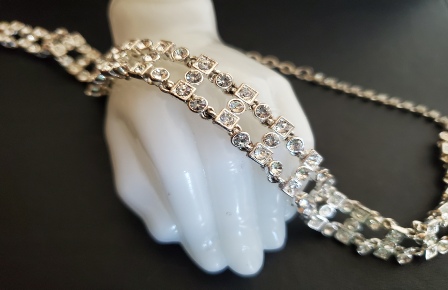 silver-tone chocker necklace with clear rhinestones, detail